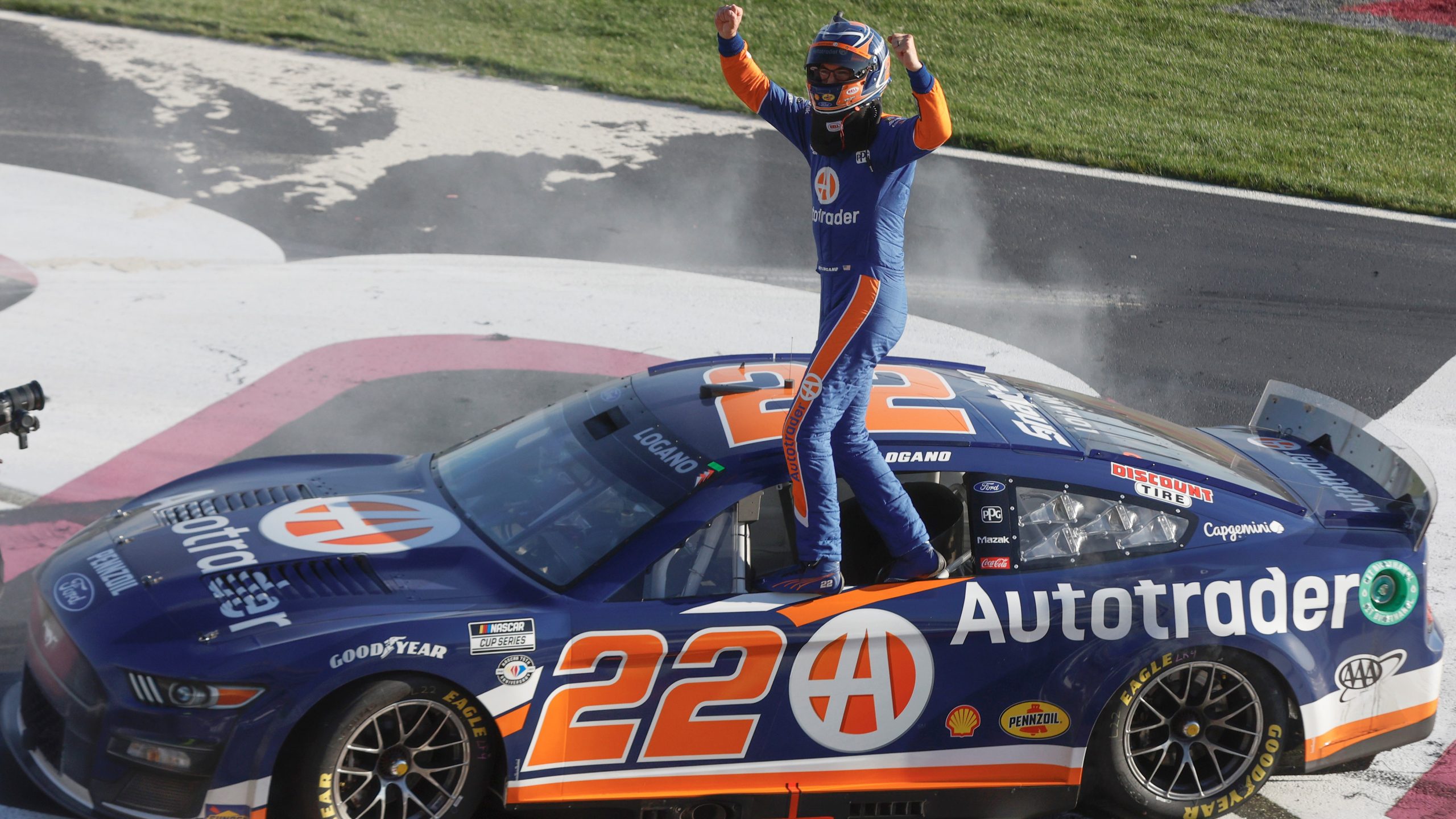 HAMPTON, GEORGIA - MARCH 19: Joey Logano, driver of the #22 Autotrader Ford, celebrates after winning the NASCAR Cup Series Ambetter Health 400 at Atlanta Motor Speedway on March 19, 2023 in Hampton, Georgia. (Photo by Sean Gardner/Getty Images)