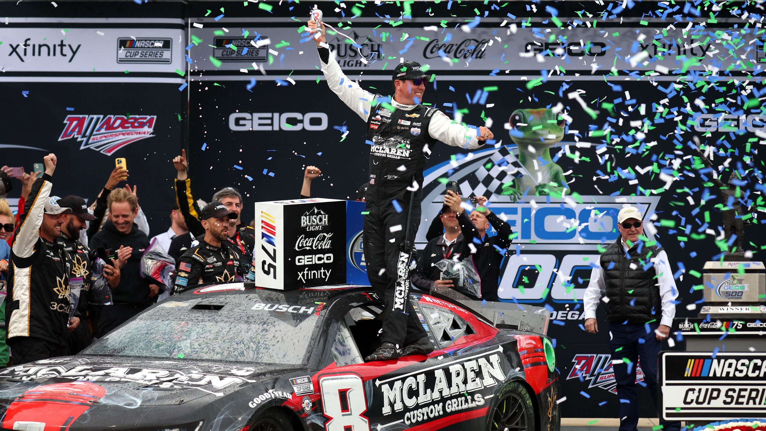 TALLADEGA, ALABAMA - APRIL 23: Kyle Busch, driver of the #8 McLaren Custom Grills Chevrolet, celebrates in Victory Lane after winning the NASCAR Cup Series GEICO 500 at Talladega Superspeedway on April 23, 2023 in Talladega, Alabama. (Photo by James Gilbert/Getty Images)